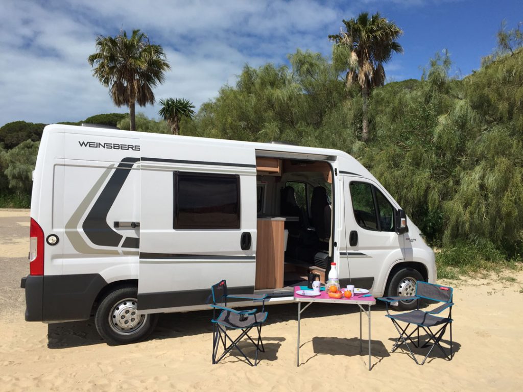 with the camper-van hire table and outdoor chairs are included